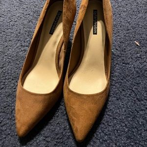 Pointed brown heels